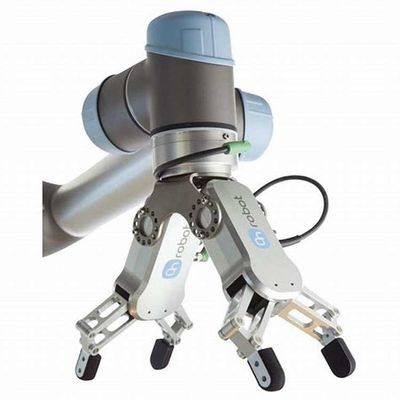 Robots collaboratifs combinés avec une poignée de bras robotique RG2 pour manipuler le CNC comme une poignée de robot